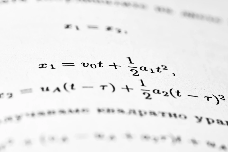 Mathematical equations are written on a white page.